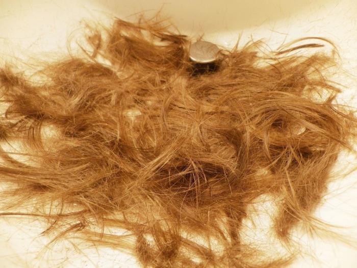 к чему снится выпадение волос пучками
