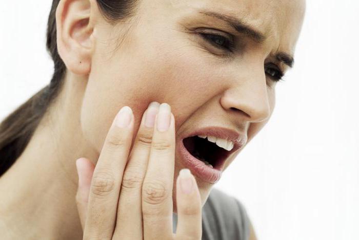 болит десна при нажатии зуба