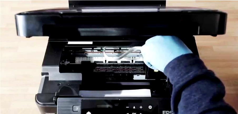 Как прочистить печатающую головку Epson?