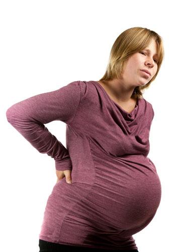 ноет поясница при беременности