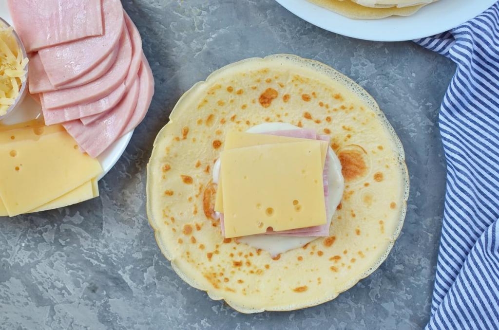 блины с ветчиной и сыром в духовке рецепт. Смотреть фото блины с ветчиной и сыром в духовке рецепт. Смотреть картинку блины с ветчиной и сыром в духовке рецепт. Картинка про блины с ветчиной и сыром в духовке рецепт. Фото блины с ветчиной и сыром в духовке рецепт